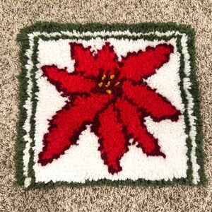 Vintage poinsettia red, white and green latch hook wall hanging